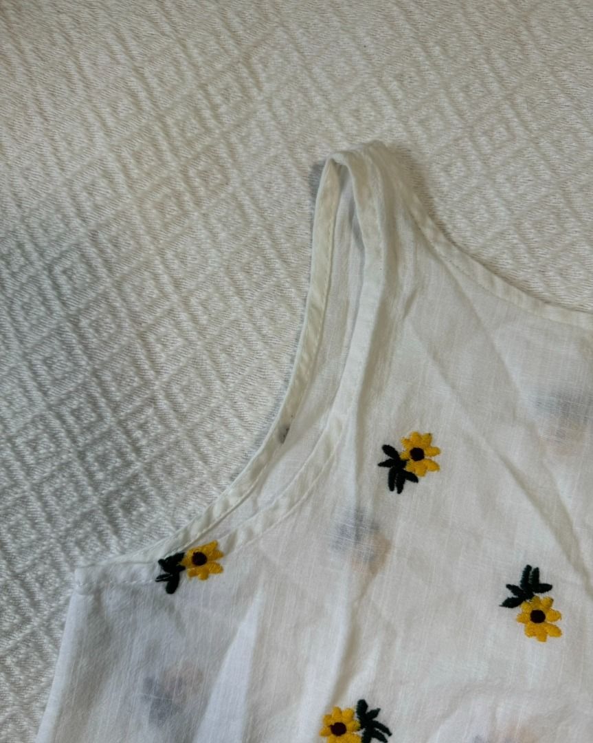 Sunflower embroidered linen top (Category: Sleeveless) located in Cainta. Submitted by pt______ (Listing ID 1339190966, Image 1). Description: Top perfect for summer :) meron syang iron stains (see 4th & 5th pic) kaya i'm selling it for a low price hehe..