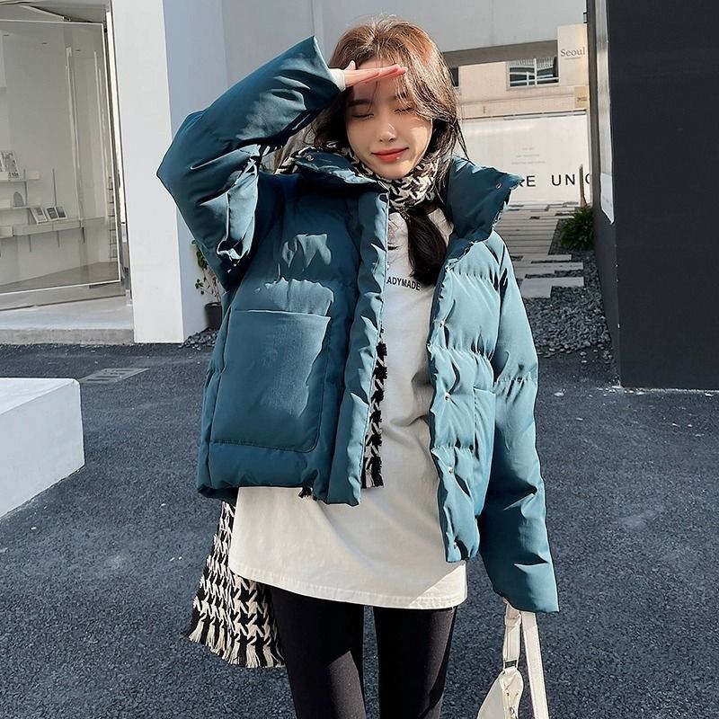 Winter Jacket (Category: Other Tops) located in Singapore. Submitted by beetrees (Listing ID 1339319945, Image 1). Description: Cotton and down winter jacket for staying fashionable while keeping warm. .
