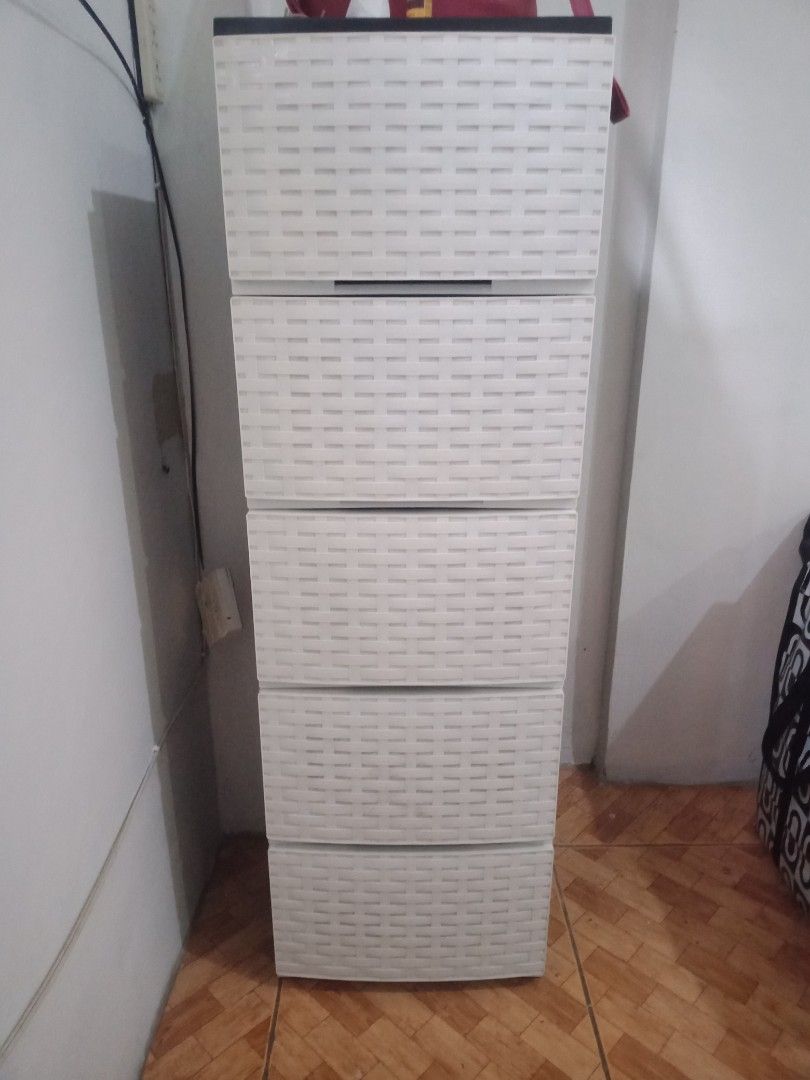 5L Drawer Slim Cabinet White (Category: Shelves, Cabinets & Racks) located in Makati City. Submitted by clutterms (Listing ID 1340952132, Image 2). Description: 5 layers color: white and black material: plastic design: weave measurement: length: 13.5 inches width: 17 inches height: 43 inches flaw: few scratches and dust and 1 tiny chip (last photo) condition: good. use for 2 years. rfs: not going to use anymore. change of furniture. sf shouldered