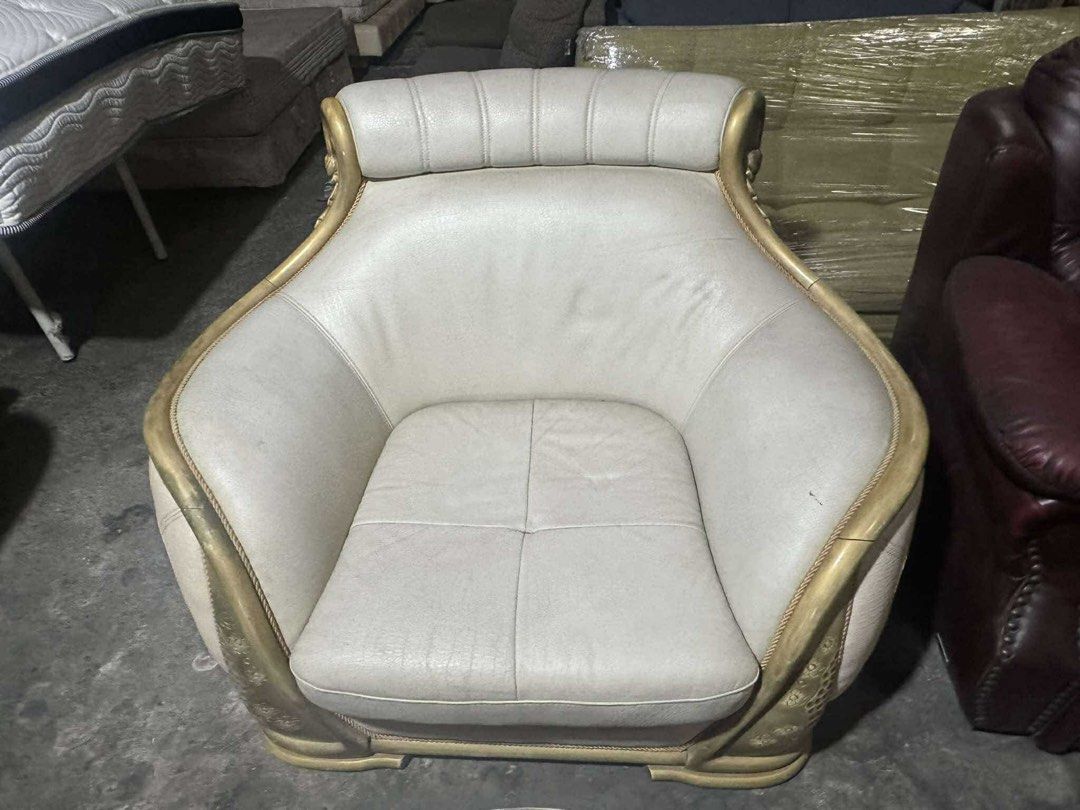 Accent sofa (Category: Sofas) located in Angeles City. Submitted by maryannmar33098 (Listing ID 1341008206, Image 2). Description: Genuine leather Solid wood Imported from Korea With minimal signs of usage Limit expectation Animal skin style leather .