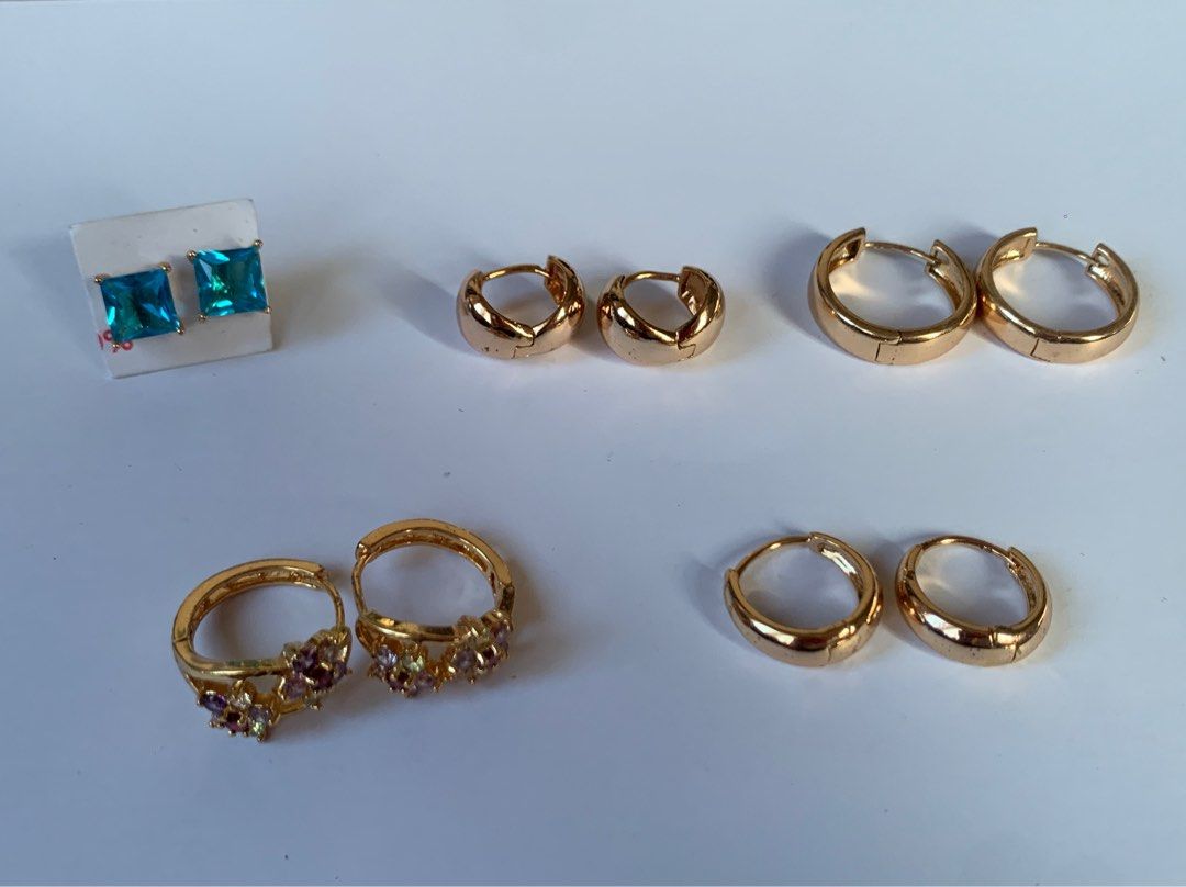 Assorted Earrings (Category: Earrings) located in Bacoor. Submitted by mydeclutt (Listing ID 1340903047, Image 1). Description: Colorful gem studs, small thick gold plated hoop earrings Ranges from PHP100-250 depending on design, price is nego and discounted if more are bought.