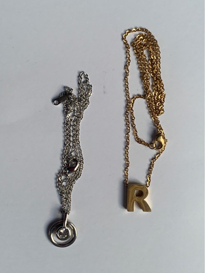 Assorted Necklaces (Category: Necklaces) located in Bacoor. Submitted by mydeclutt (Listing ID 1340906606, Image 1). Description: Gold Plated ‘R’ Initial Necklace - PHP70 Silver necklace - PHP120.