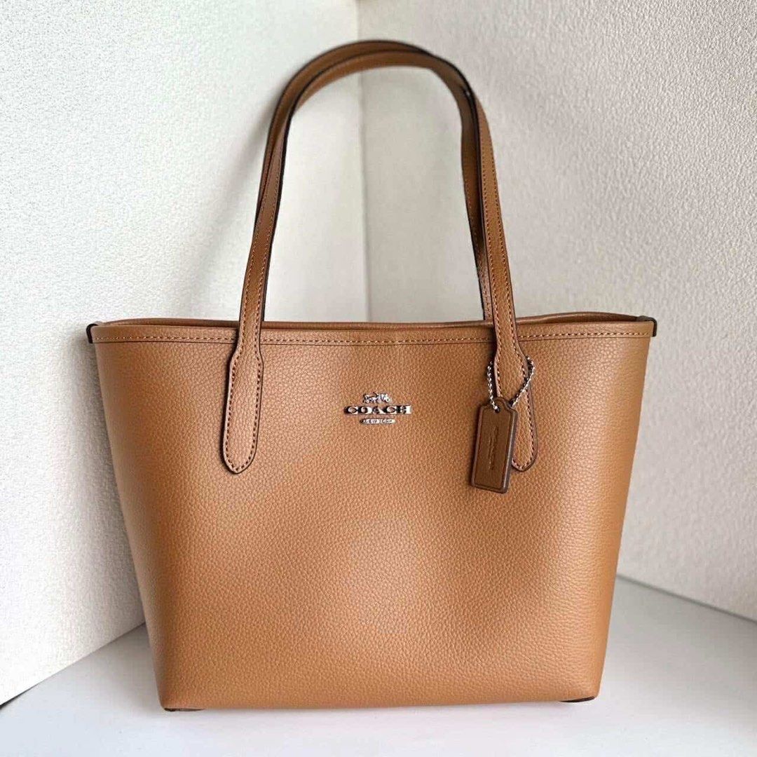 Coach Small City Tote (Category: Luxury Bags & Wallets) located in Rizal. Submitted by LuxbyMarifrance (Listing ID 1340961413, Image 1). Description: 🏷️ 2,300 only + SF 🧳 Coach Small City Tote 📏 Length: 10.0”; Height: 5.75”;Width: 4.75 📌 with dust bag, paper bag and care card ✨All trademarks, logos and brand names are reserved and property of the original brand owner. #coachph #authenticqualitybagsph #authenticqualitybags #lowestpriceguarante