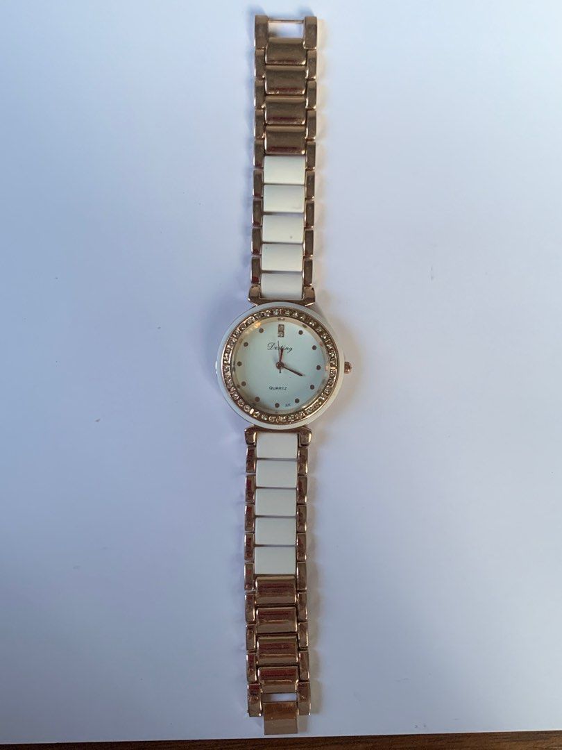 Destiny Quartz Watch (Category: Women's Watches) located in Bacoor. Submitted by mydeclutt (Listing ID 1340904110, Image 2). Description: Classy white-gold watch with complete rhinestones around the face.