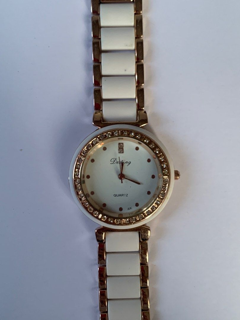 Destiny Quartz Watch (Category: Women's Watches) located in Bacoor. Submitted by mydeclutt (Listing ID 1340904110, Image 1). Description: Classy white-gold watch with complete rhinestones around the face.