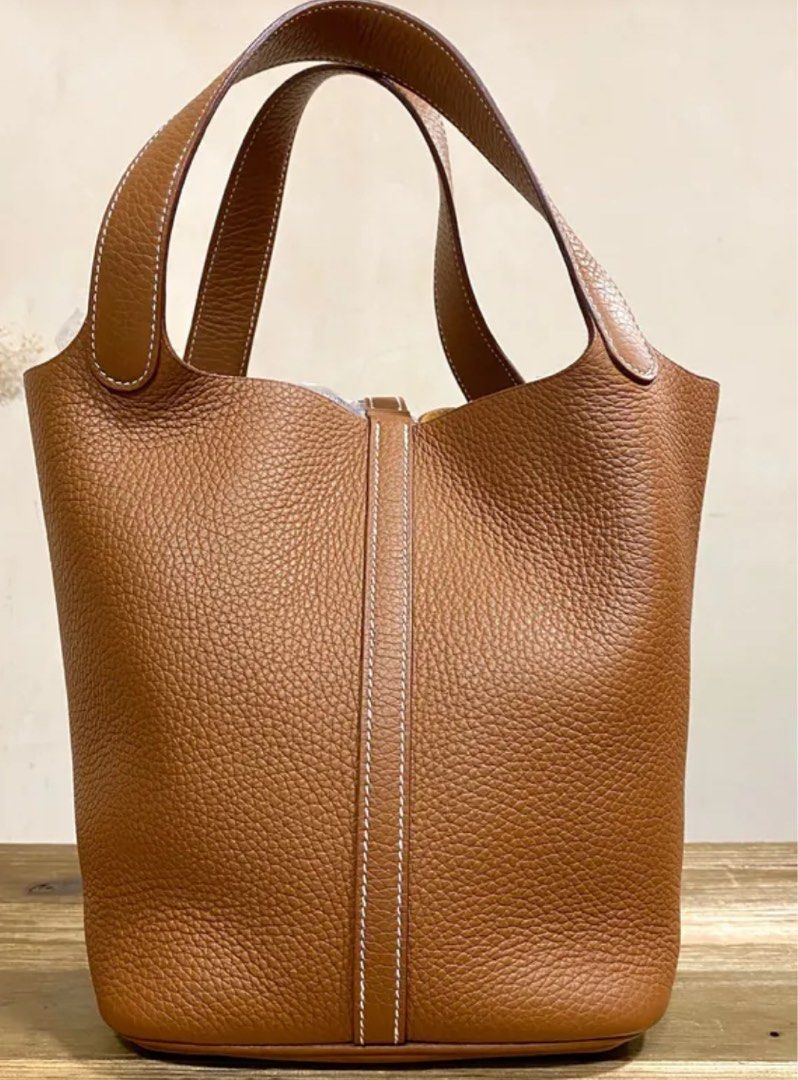 Hermes Picotin 22 Gold SHW (Category: Luxury Bags & Wallets) located in Quezon City. Submitted by __12345 (Listing ID 1340934340, Image 3). Description: Hard to find color!!! 🤎 - Preorder (2 weeks eta) - 9.5/10 like new condition - Stamp U - Includes dustbag, box, lock & key - Entrupy available upon request - Available for meet ups/delivery - Detailed photos available upon request - Guaranteed authentic or money back! Open to sourcing requests! 