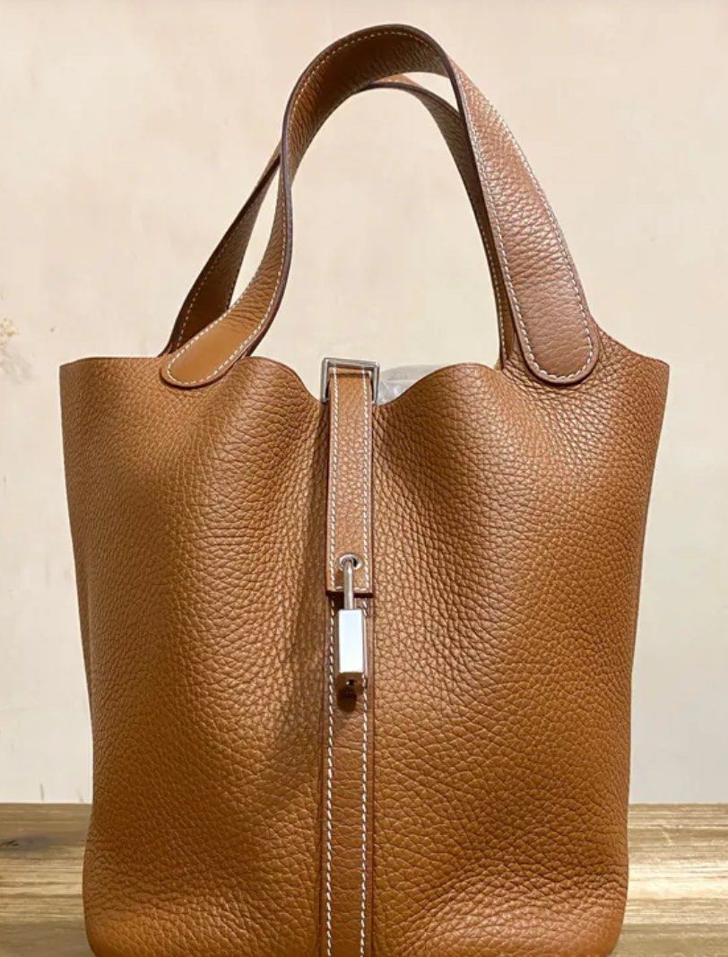 Hermes Picotin 22 Gold SHW (Category: Luxury Bags & Wallets) located in Quezon City. Submitted by __12345 (Listing ID 1340934340, Image 2). Description: Hard to find color!!! 🤎 - Preorder (2 weeks eta) - 9.5/10 like new condition - Stamp U - Includes dustbag, box, lock & key - Entrupy available upon request - Available for meet ups/delivery - Detailed photos available upon request - Guaranteed authentic or money back! Open to sourcing requests! 