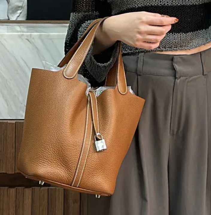 Hermes Picotin 22 Gold SHW (Category: Luxury Bags & Wallets) located in Quezon City. Submitted by __12345 (Listing ID 1340934340, Image 1). Description: Hard to find color!!! 🤎 - Preorder (2 weeks eta) - 9.5/10 like new condition - Stamp U - Includes dustbag, box, lock & key - Entrupy available upon request - Available for meet ups/delivery - Detailed photos available upon request - Guaranteed authentic or money back! Open to sourcing requests! 