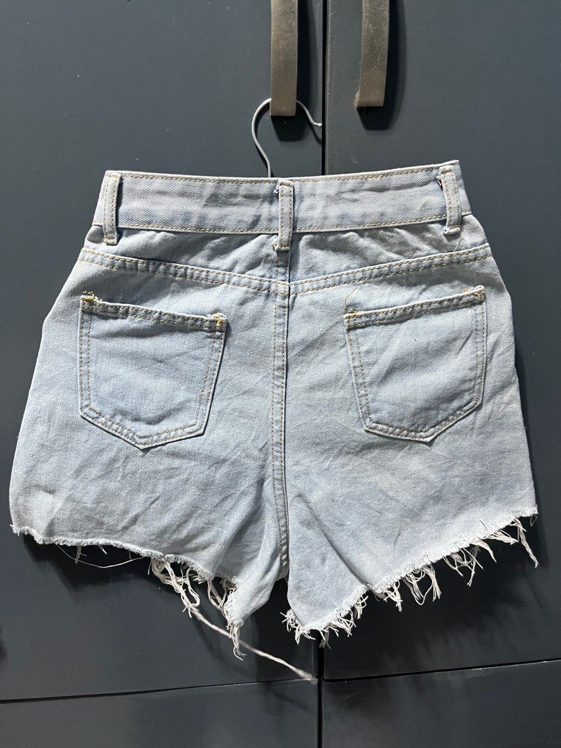 Highwaist shorts (tattered) (Category: Shorts) located in Malabon City. Submitted by manymoon (Listing ID 1340980010, Image 2). Description: Size 22-23 Length: 13 inches Condition: well used Malabon area .