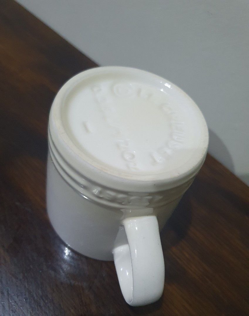 Le Creuset Mug (Category: Coffee & Tea Tableware) located in Davao. Submitted by rare_finds_dvo_trd (Listing ID 1340974425, Image 3). Description: w/ tiny factory defect on handle. ***auto pass on low baller pls..