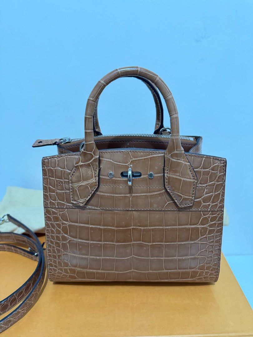 Louis Vuitton Steamer Mini Croc Leather (Category: Luxury Bags & Wallets) located in Manila. Submitted by mabuhaymiles (Listing ID 1340984047, Image 2). Description: .