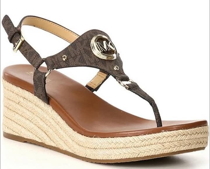 MK sandals like new with tag size 9 (Category: Luxury Apparel) located in Manila. Submitted by luis3191 (Listing ID 1340949359, Image 1). Description: Michael Kors Casey Signature Logo Leather Wedge Espadrille Sandals - size 9 ✅ Brand new ✅Leather upper with signature MK hardware ✅Buckle closure ✅Synthetic lining ✅Rubber outsole ✅Approx. 2.5" wedge height ✅Approx. 1" platform height.