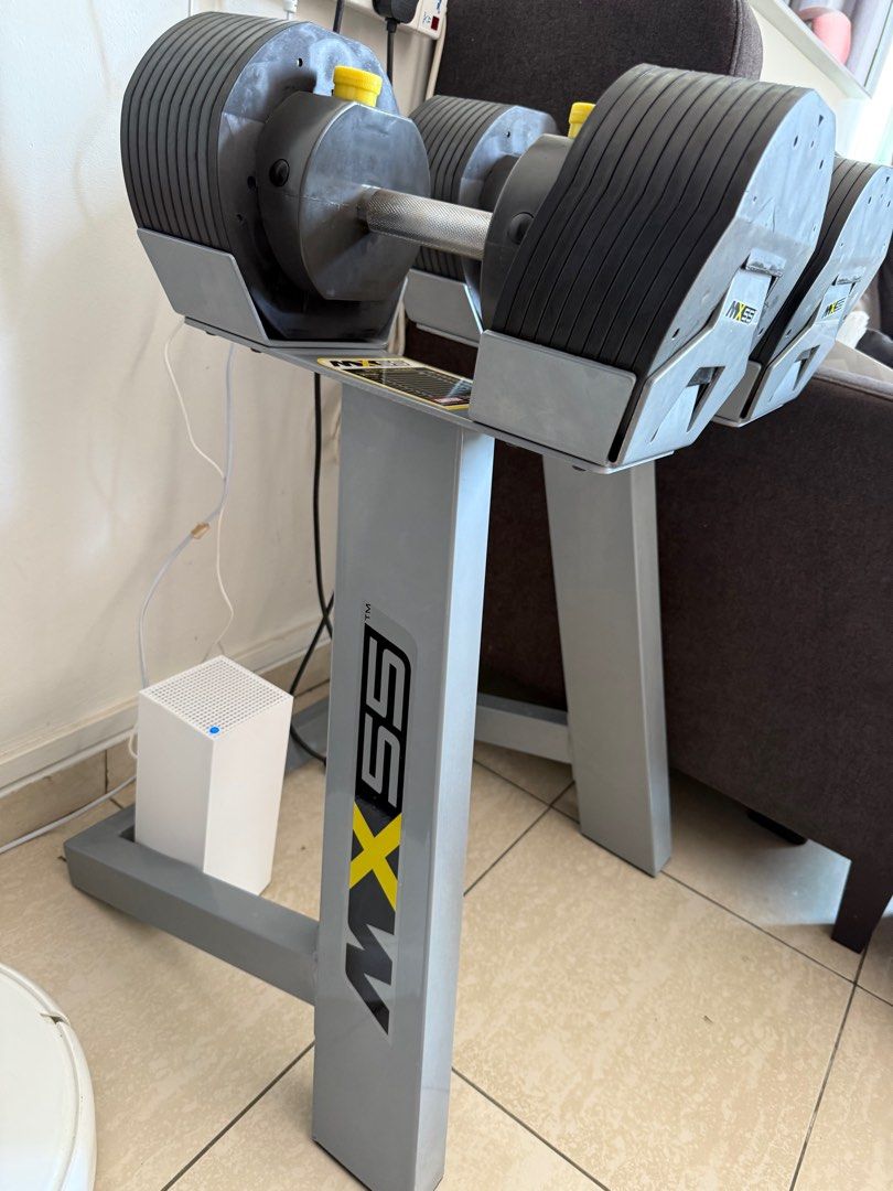 Mx55 adjustable dumbbell (Category: Weights & Dumbbells) located in Singapore. Submitted by MangBaldougg (Listing ID 1340864458, Image 3). Description: Still in good condition adjustable dumbbell Self collect at my place With stand .