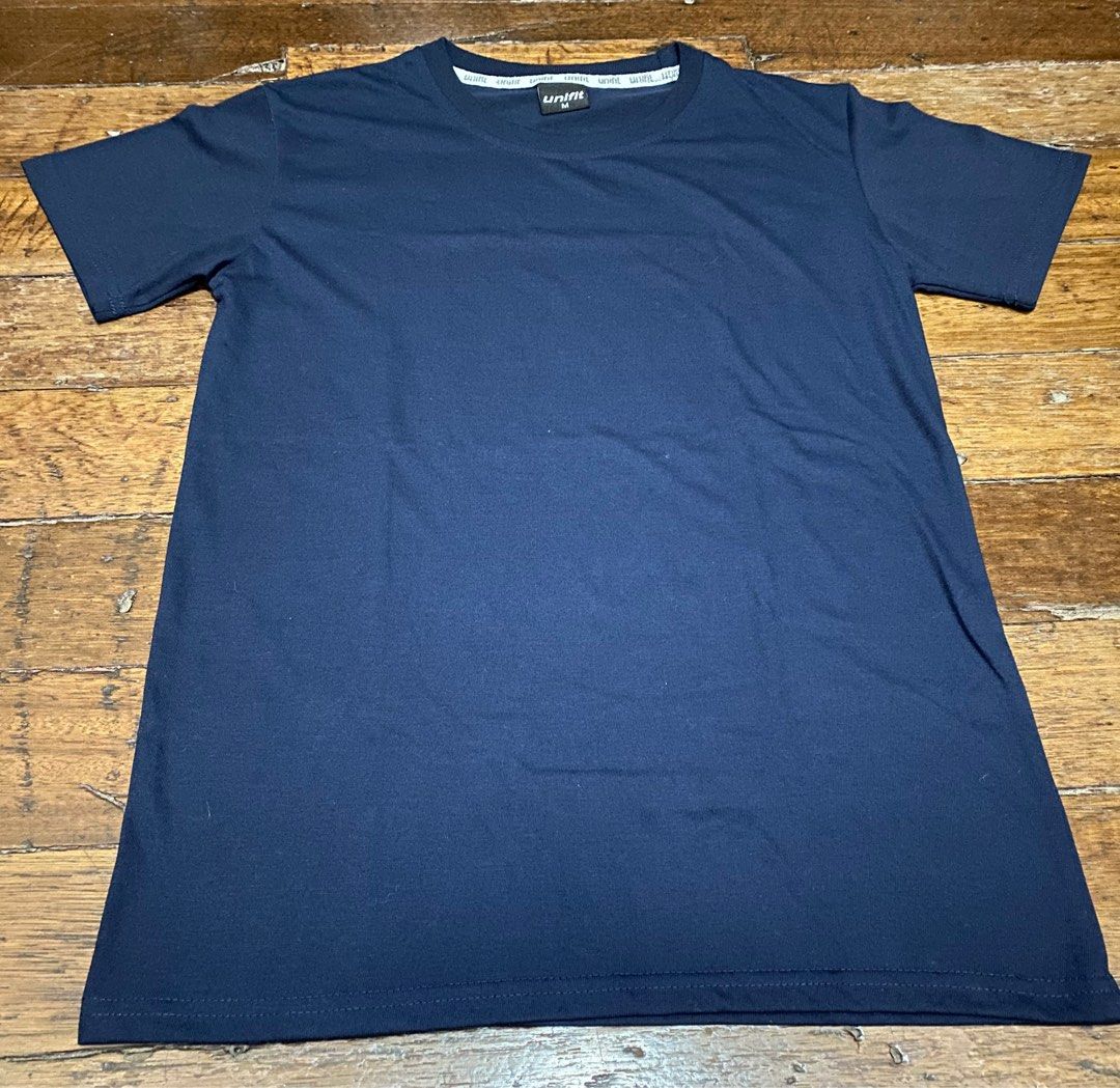 Plain blue sports shirt (Category: Activewear) located in Manila. Submitted by kookoocart (Listing ID 1340875168, Image 1). Description: Size on tag: Medium Length: 25 Width: 18 MOP: Gcash MOD: J&T, SDD (joyride, lalamove) Meetup: Around DLSU.