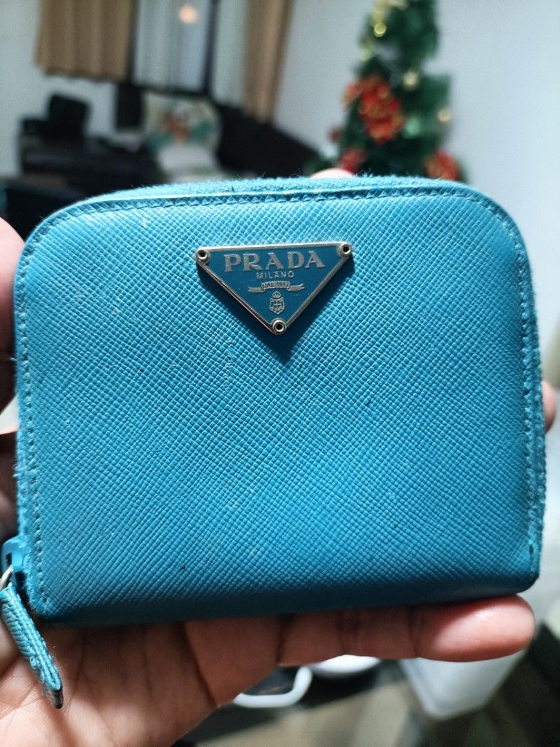 Prada Wallet Original Authentic (Category: Luxury Bags & Wallets) located in Gapan. Submitted by prelovedstuff32 (Listing ID 1340965348, Image 1). Description: authentic/ original prada mini wallet ..last price posted free shipping ..hindi po ito brand new pero sure na original at maganda pa lampo zipper pero di ko makunan pic dahil mahirap pic ung likod ng zipper ng wallet.