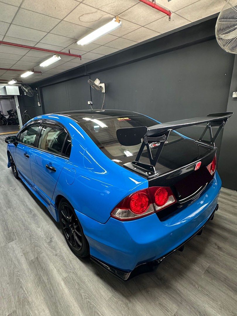Sporty blue Honda Civic for rent (Category: Car Rental) located in Singapore. Submitted by dzg_carrental (Listing ID 1234909910, Image 2). Description: Honda Civic car rental for personal usage! Daily @ ONLY $90 !! (Minimum 2 days) Minimum 2yrs driving experience Age 22yrs old and above WEEKDAY PACKAGE Monday - Friday (4days) @ $320 WEEKEND PACKAGE Friday - Monday (3 days) @ $320 WEEKLY PACKAGE @ $470 💰 LOW DEPOSIT to drive away from $200! Exhau