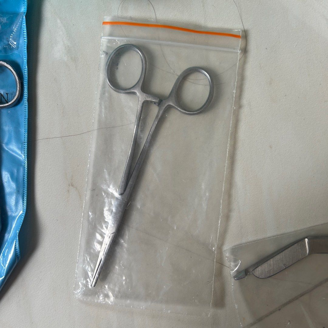 Surgical Tools Forceps Scissors (Category: Medical Supplies & Tools) located in Manila. Submitted by smolambean (Listing ID 1340910814, Image 3). Description: • Kelly Forceps (Curved) - SOLD • Kelly forceps (straight) • Surgical Scissors (straight) • Bandage scissors • Tuning fork.