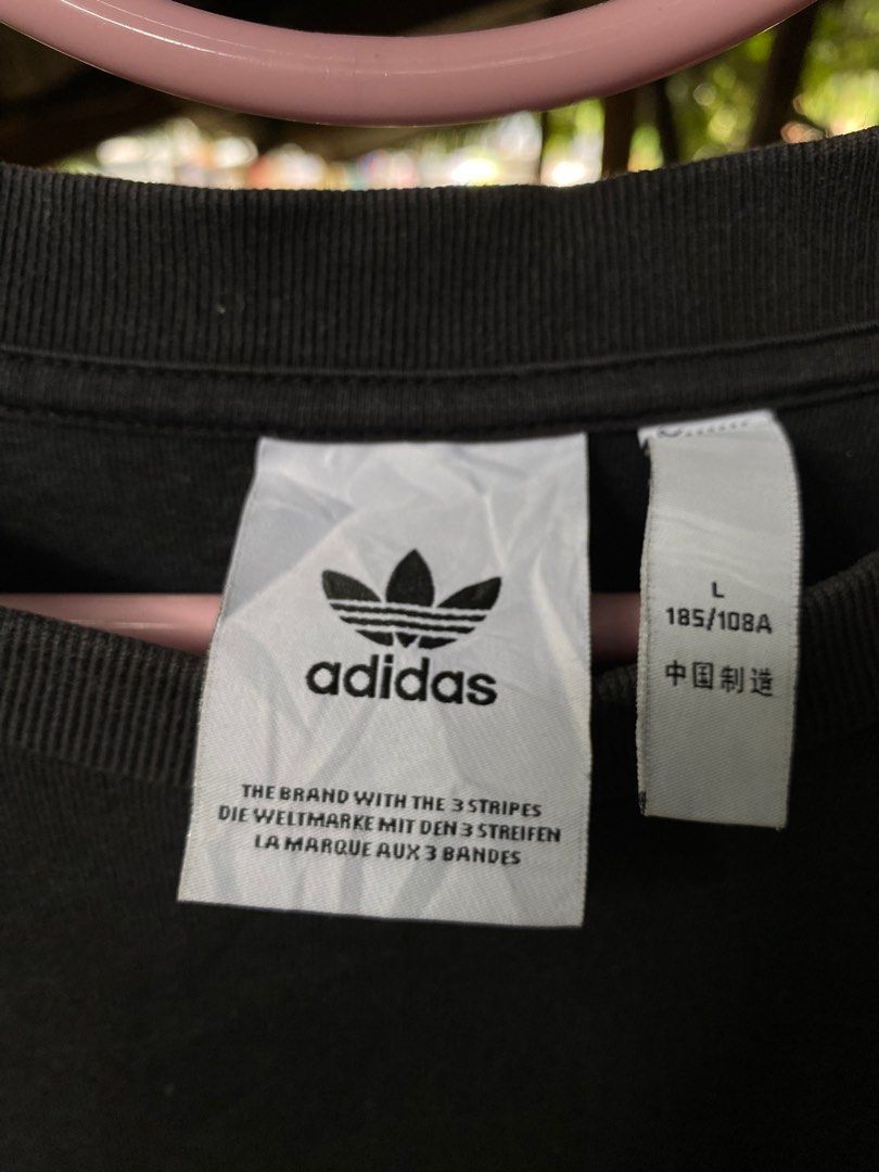 Adidas Graphic Pakaian Sweatshirt (Category: Coats, Jackets and Outerwear) located in Davao. Submitted by thriftnroll (Listing ID 1341102584, Image 3). Description: Adidas Pakaian Sweater Good Condition 9/10 CR 24x30 400 Shipped .