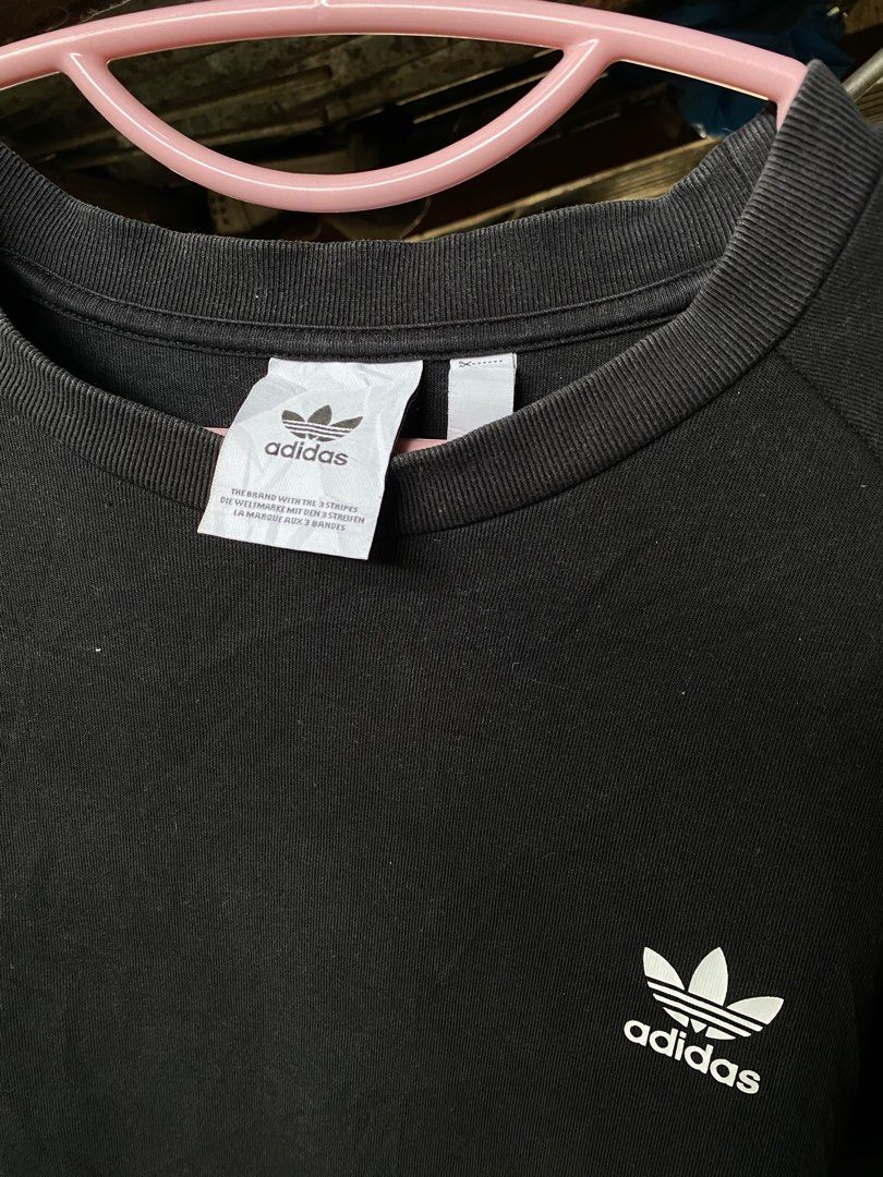 Adidas Graphic Pakaian Sweatshirt (Category: Coats, Jackets and Outerwear) located in Davao. Submitted by thriftnroll (Listing ID 1341102584, Image 2). Description: Adidas Pakaian Sweater Good Condition 9/10 CR 24x30 400 Shipped .