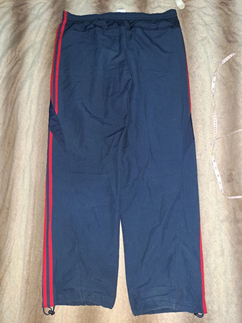 Adidas Track Pants (Category: Joggers) located in Cabanatuan. Submitted by jaipscl (Listing ID 1341117732, Image 2). Description: See flaw in the last photo (small pinhole) XLarge on tag 100% Polyester Mesh inner lining Made in the Philippines L: 41 in W: 36 in (adjustable drawstring) Hem: 9 and below (adjustable) CashG payment.
