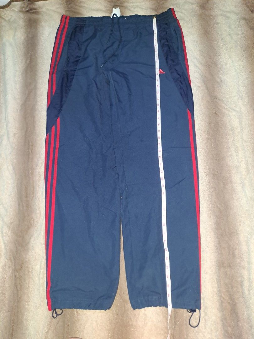 Adidas Track Pants (Category: Joggers) located in Cabanatuan. Submitted by jaipscl (Listing ID 1341117732, Image 3). Description: See flaw in the last photo (small pinhole) XLarge on tag 100% Polyester Mesh inner lining Made in the Philippines L: 41 in W: 36 in (adjustable drawstring) Hem: 9 and below (adjustable) CashG payment.