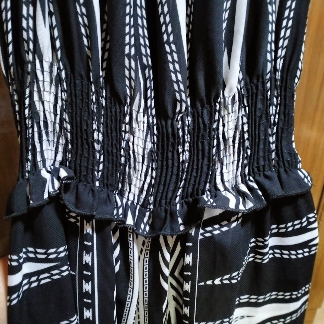 BLACK AND WHITE JUMPSUIT (Category: Jumpsuits) located in Manila. Submitted by her_itemsph (Listing ID 1341055533, Image 2). Description: ~ 👋Hi, do you wanna feel like a diva while walking at the beachfront? Well then, this jumpsuit is made exactly for that scene! Try on this and feel the beach-y vibe with a bit of drama! 😎 Brand: Genevieve Type: Jumpsuit, Flowy, Fabric is Medium-Thin, It also has some small cuts on both sides of the bottom for