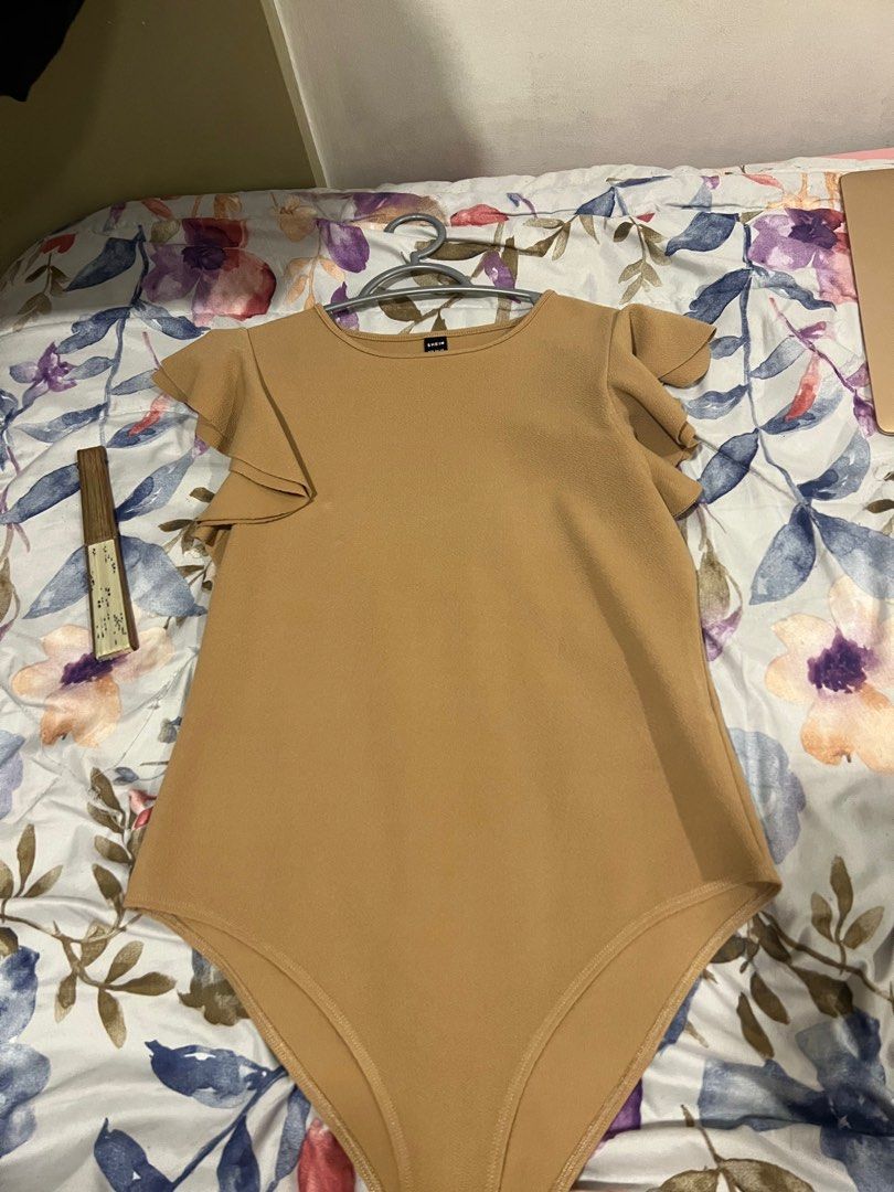 BLOUSE FOR SALE (Category: Blouses) located in Cainta. Submitted by alysaap (Listing ID 1341211984, Image 2). Description: Bodysuit styles Used with care All 200 price is negotiable .