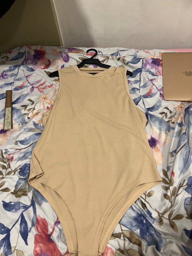 BLOUSE FOR SALE (Category: Blouses) located in Cainta. Submitted by alysaap (Listing ID 1341211984, Image 1). Description: Bodysuit styles Used with care All 200 price is negotiable .