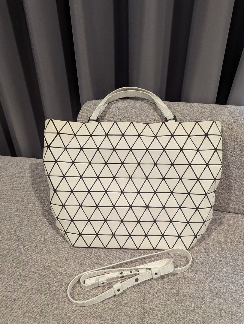 BNEW Baobao Issey Miyake matte white (Category: Luxury Bags & Wallets) located in Quezon City. Submitted by vert1cal (Listing ID 1341051983, Image 1). Description: BNEW Baobao Issey Miyake matte white With removable strap 16.5" length 10" height (14" if with handle) 5.5" depth Includes dust bag and cards.