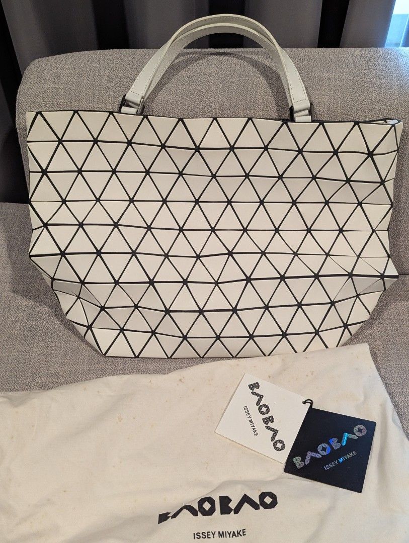 BNEW Baobao Issey Miyake matte white (Category: Luxury Bags & Wallets) located in Quezon City. Submitted by vert1cal (Listing ID 1341051983, Image 2). Description: BNEW Baobao Issey Miyake matte white With removable strap 16.5" length 10" height (14" if with handle) 5.5" depth Includes dust bag and cards.