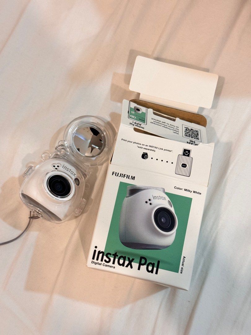 Fujifilm Instax Pal (Category: Cameras) located in Calamba. Submitted by Hk1995 (Listing ID 1341191694, Image 2). Description: FUJIFILM INSTAX PAL WHITE Almost brand new Bought October 2024– tried but not used Comes with box and accessories (2 free cases).