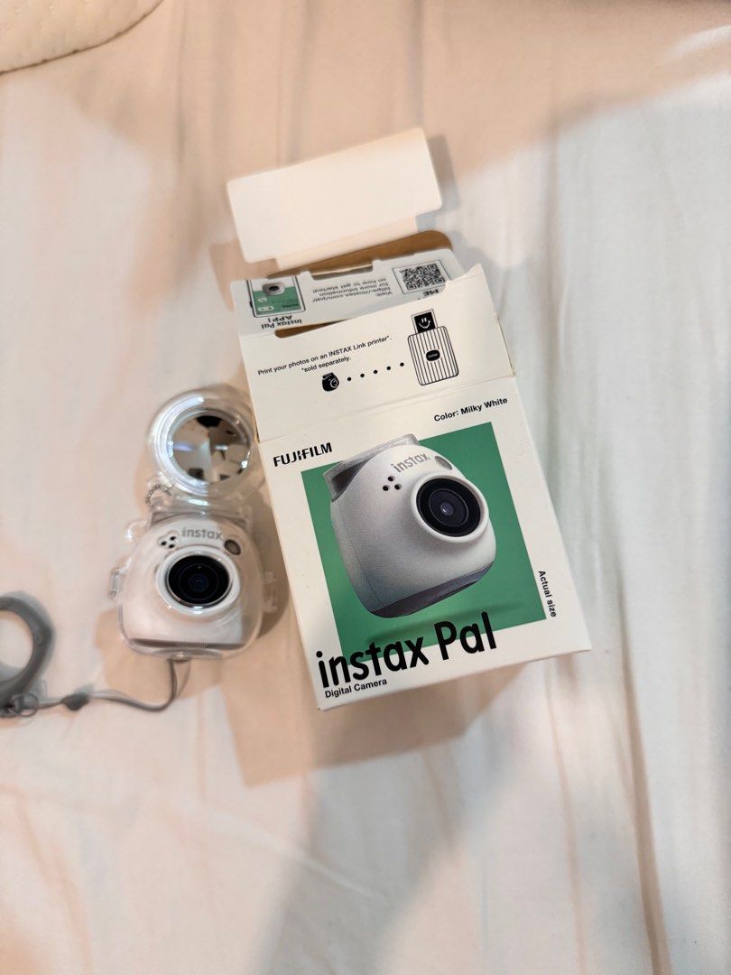 Fujifilm Instax Pal (Category: Cameras) located in Calamba. Submitted by Hk1995 (Listing ID 1341191694, Image 3). Description: FUJIFILM INSTAX PAL WHITE Almost brand new Bought October 2024– tried but not used Comes with box and accessories (2 free cases).