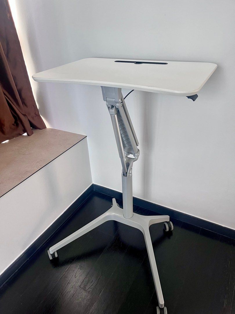 Height adjustable table (Category: Tables & Sets) located in Singapore. Submitted by typoerror (Listing ID 1341052284, Image 2). Description: Selling as I no longer need it. Height adjustment mechanism works perfectly. .