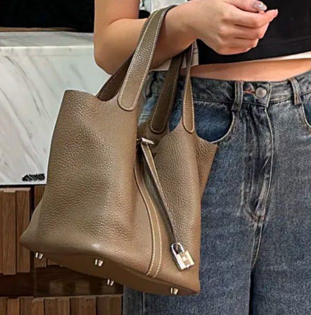 Hermes Picotin 22 Etoupe PHW (Category: Luxury Bags & Wallets) located in Quezon City. Submitted by __12345 (Listing ID 1341062734, Image 1). Description: - Preorder (2 weeks eta) - 9/10 condition - Stamp Y - Full set (includes dustbag, box, lock & key, receipt) - Entrupy available upon request - Available for meet ups/delivery - Detailed photos available upon request - Guaranteed authentic or money back! Open to sourcing requests! Send us a mess