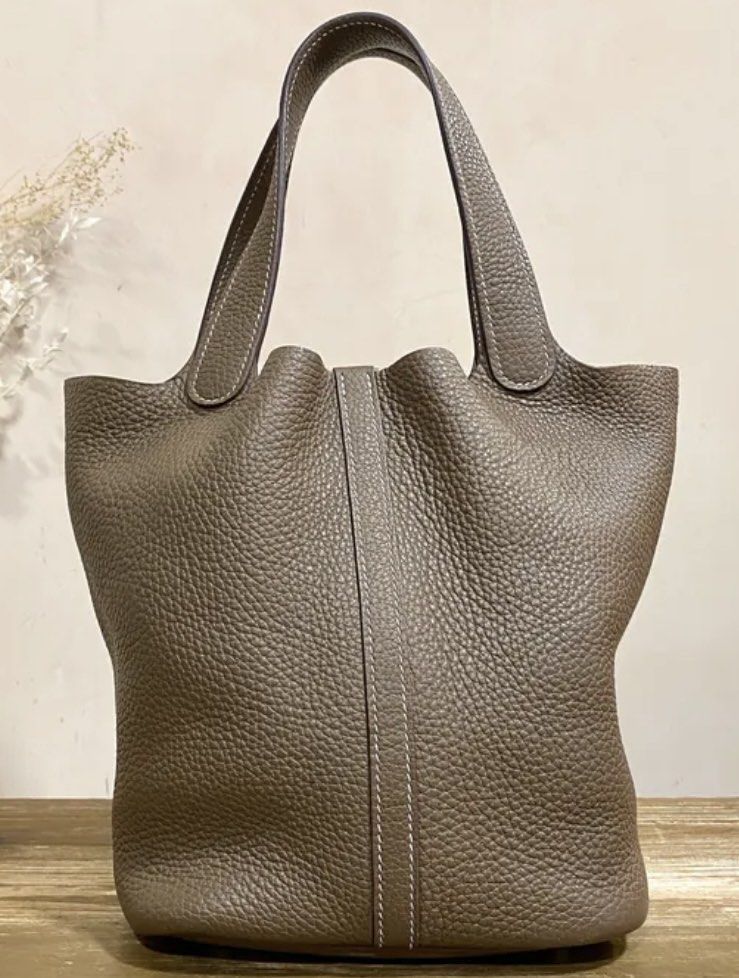 Hermes Picotin 22 Etoupe PHW (Category: Luxury Bags & Wallets) located in Quezon City. Submitted by __12345 (Listing ID 1341062734, Image 2). Description: - Preorder (2 weeks eta) - 9/10 condition - Stamp Y - Full set (includes dustbag, box, lock & key, receipt) - Entrupy available upon request - Available for meet ups/delivery - Detailed photos available upon request - Guaranteed authentic or money back! Open to sourcing requests! Send us a mess