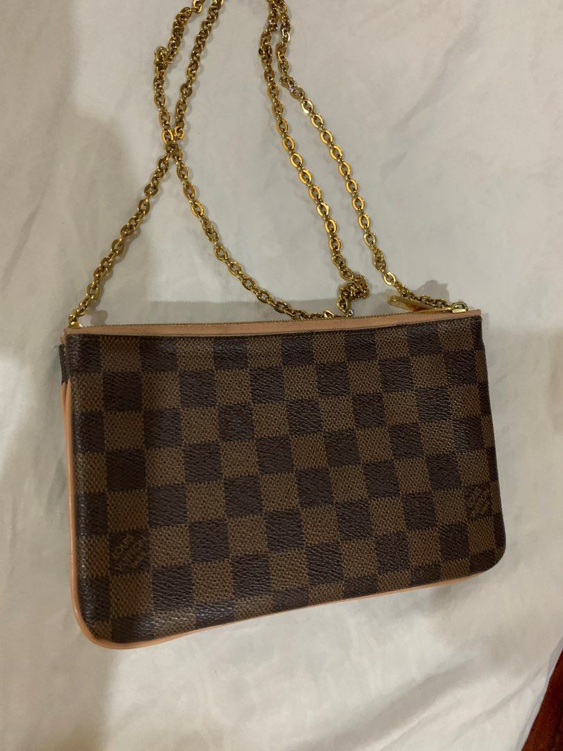 Louis Vuitton Twin Pochette (Category: Luxury Bags & Wallets) located in Antipolo. Submitted by ryse2 (Listing ID 1341164519, Image 3). Description: With small red stain inside. Bought from canonbagsprime in IG. Provided dustbag included. Guaranteed authentic. Fits regular iphone Price is negotiable.