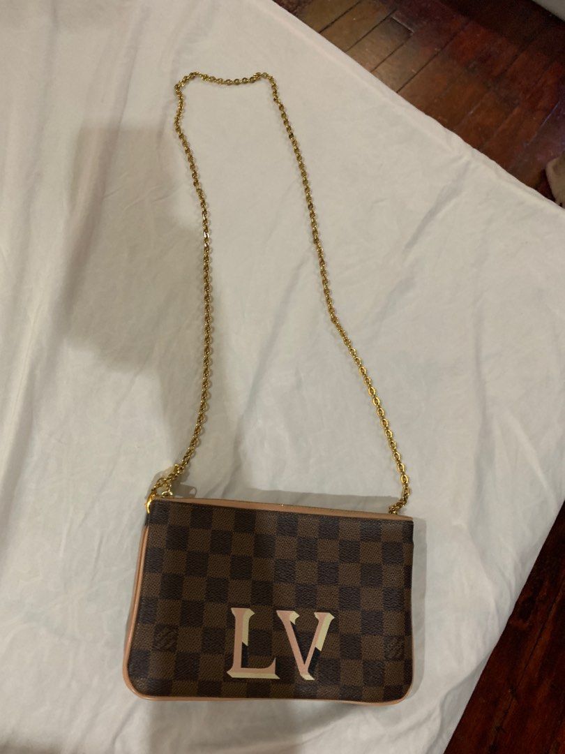 Louis Vuitton Twin Pochette (Category: Luxury Bags & Wallets) located in Antipolo. Submitted by ryse2 (Listing ID 1341164519, Image 2). Description: With small red stain inside. Bought from canonbagsprime in IG. Provided dustbag included. Guaranteed authentic. Fits regular iphone Price is negotiable.