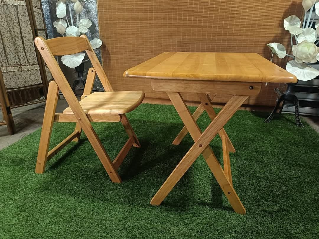 Solid wood folding table (Category: Tables & Sets) located in Quezon City. Submitted by matetdevis13 (Listing ID 1341203862, Image 1). Description: 😍 SOLID WOOD!!! HEAVY-DUTY!!! 😍 Thick Solid wood Folding Table & Chair set Indoor or Outdoor, Study Table, Coffee Table Price : 4,200 Table size 31 x 23 x 27H inches In VERY good condition Code HOMEBOSS 106.