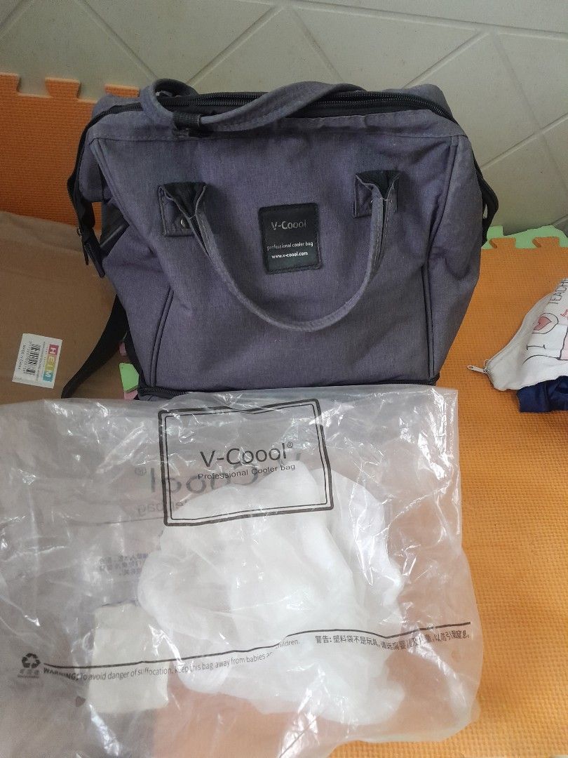 Vcool breastfeeding pump bag (Category: Breastfeeding & Bottle Feeding) located in Angeles City. Submitted by declutterhub (Listing ID 1341192040, Image 2). Description: with minor flaw,but does not affect the purpose. rfs: end of pumping journey.
