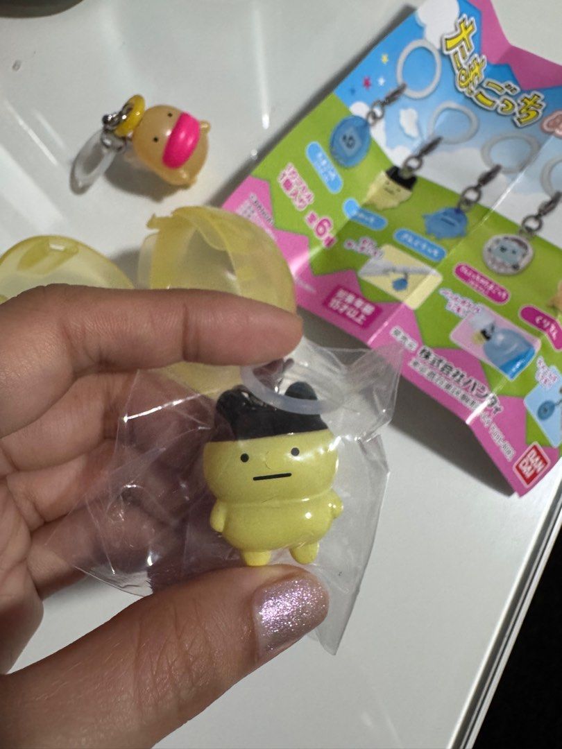 Angelgotchi Mametchi Bandai Gachapon Authentic from Japan (Category: Designer & Blind Box Toys) located in Manila. Submitted by marieangelita (Listing ID 1341321095, Image 1). Description: Angelgotchi Mametchi Bandai Gachapon Authentic from Japan Brand new and Unopened Bought from Japan Gachapon Keychain.