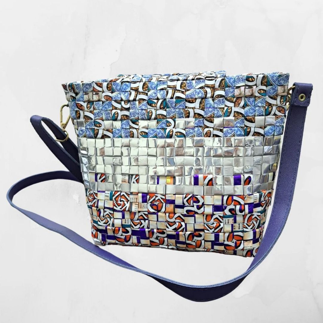 Blue Moonbeam - Upcycled Sling Handbag (Category: Cross-body Bags) located in Singapore. Submitted by bcaresg (Listing ID 1341319391, Image 2). Description: Upcycled bag made from recycled plastic Dimensions: Width: 24 cm, Height: 19 cm This unique handbag is a true piece of art, handcrafted using recycled materials. Its stunning mosaic-like design features vibrant colors and textures, making it both sustainable and stylish. Perfect for eco-consc