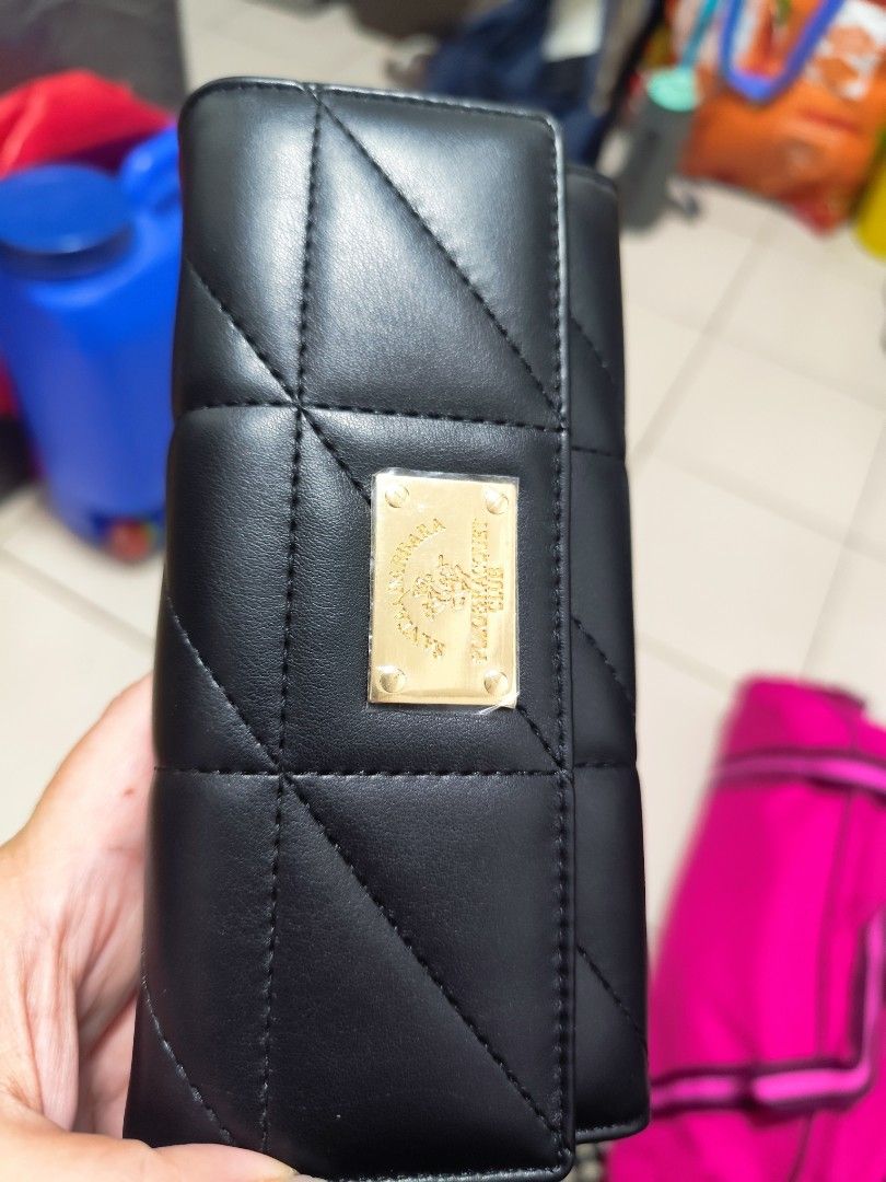 Brandnew wallet (Category: Luxury Bags & Wallets) located in Paranaque City. Submitted by annehunson (Listing ID 1341396622, Image 1). Description: Brand new black wallet. RFS decluttering.