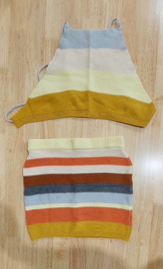 Knitted top and skirt (Category: Sets or Coordinates) located in Quezon City. Submitted by letsdecluttermanila (Listing ID 1341266297, Image 2). Description: body hugging sets, super cute in actual..ang ganda ng quality used once lang...pm lang po sa may gusto...