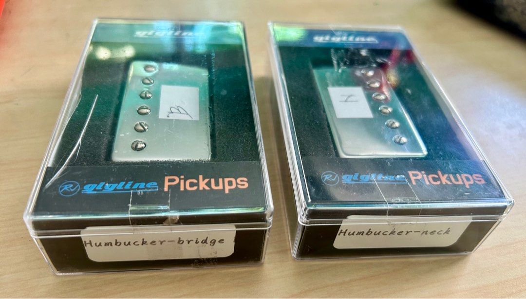 Les Paul guitar pick up humbucker (Category: Musical Instruments) located in Paranaque City. Submitted by dominiclorico (Listing ID 1341309476, Image 2). Description: Les Paul Humbucker pick ups neck and bridge for sale. Php 1200 only for the set (the neck and bridge). Almost brand new, use only for 3 months for hobby electric guitar. Stainless chrome. Sounds great for Les Paul guitar. Rfs/ Upgraded my guitar’s pick up. Can do shipping or lalamov