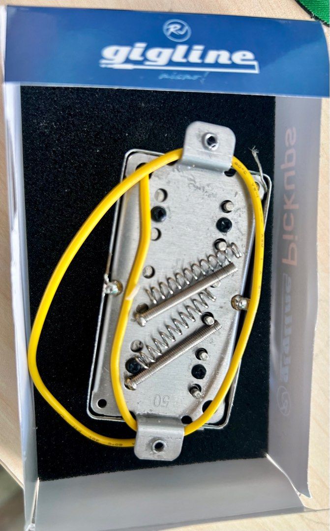 Les Paul guitar pick up humbucker (Category: Musical Instruments) located in Paranaque City. Submitted by dominiclorico (Listing ID 1341309476, Image 3). Description: Les Paul Humbucker pick ups neck and bridge for sale. Php 1200 only for the set (the neck and bridge). Almost brand new, use only for 3 months for hobby electric guitar. Stainless chrome. Sounds great for Les Paul guitar. Rfs/ Upgraded my guitar’s pick up. Can do shipping or lalamov