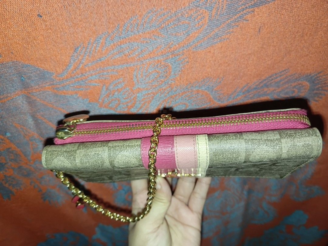 Pre-owned Authentic Lovcat CP Wallet Sling (Category: Luxury Bags & Wallets) located in Davao. Submitted by psmerchandfashion (Listing ID 1341385256, Image 2). Description: Like new, rarely used Has 15 card pockets Price negotiable for sure buyers Bought this for 2,800.00.