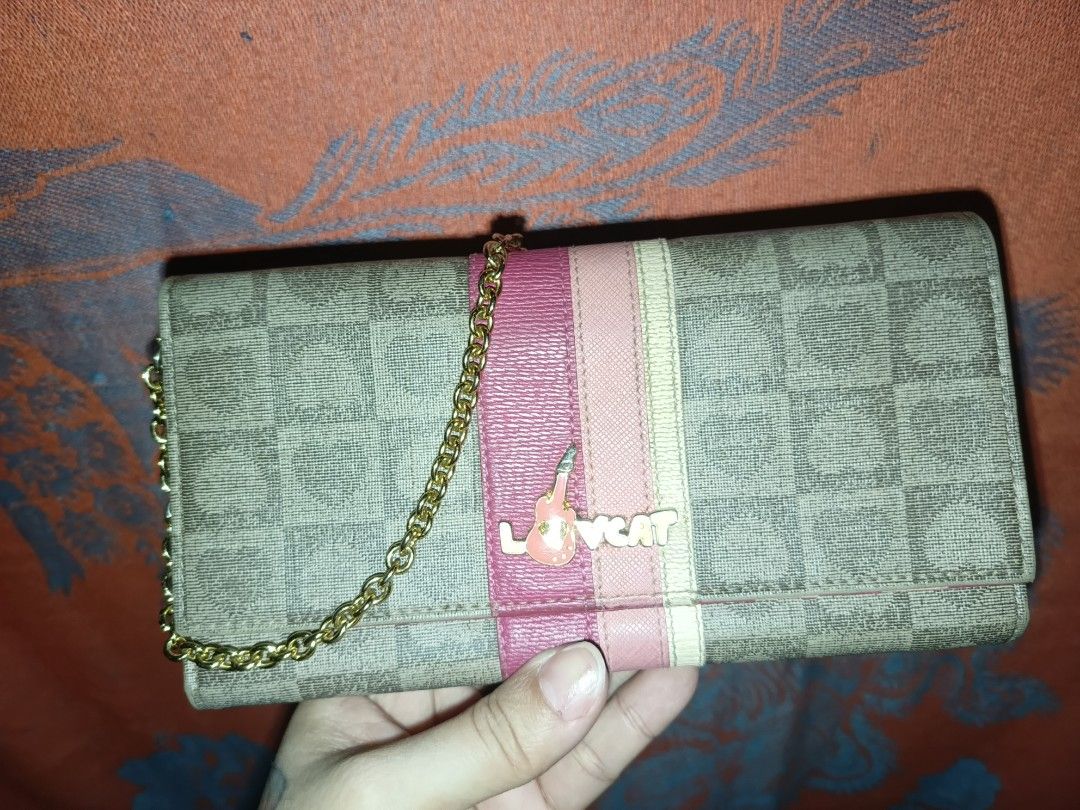 Pre-owned Authentic Lovcat CP Wallet Sling (Category: Luxury Bags & Wallets) located in Davao. Submitted by psmerchandfashion (Listing ID 1341385256, Image 1). Description: Like new, rarely used Has 15 card pockets Price negotiable for sure buyers Bought this for 2,800.00.