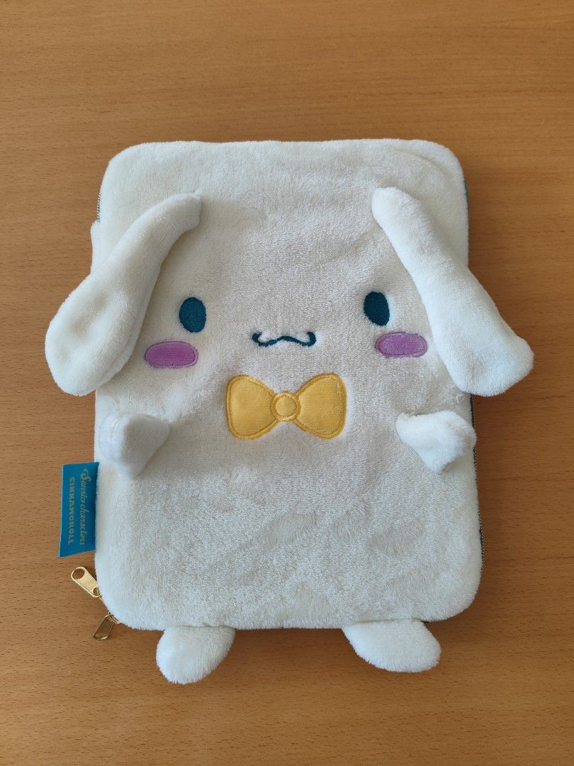 Sanrio Cinnamoroll Large Padded Multi Pouch (Category: Purses & Pouches) located in Manila. Submitted by aasmoothie (Listing ID 1341234174, Image 1). Description: Brand: Sanrio Condition: Light use but has loose stitching on Cinnamoroll's ears and hands. Description: Original Sanrio product. Multi-pouch can store and carry devices up to 10.9 inches. Suitable for stationery storage, school/ office use, even storing personal care items. Bought in 2