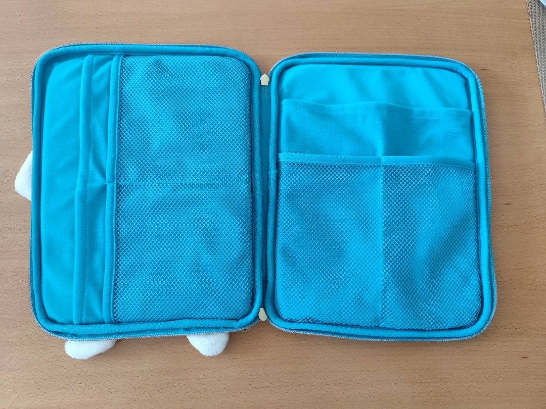 Sanrio Cinnamoroll Large Padded Multi Pouch (Category: Purses & Pouches) located in Manila. Submitted by aasmoothie (Listing ID 1341234174, Image 2). Description: Brand: Sanrio Condition: Light use but has loose stitching on Cinnamoroll's ears and hands. Description: Original Sanrio product. Multi-pouch can store and carry devices up to 10.9 inches. Suitable for stationery storage, school/ office use, even storing personal care items. Bought in 2