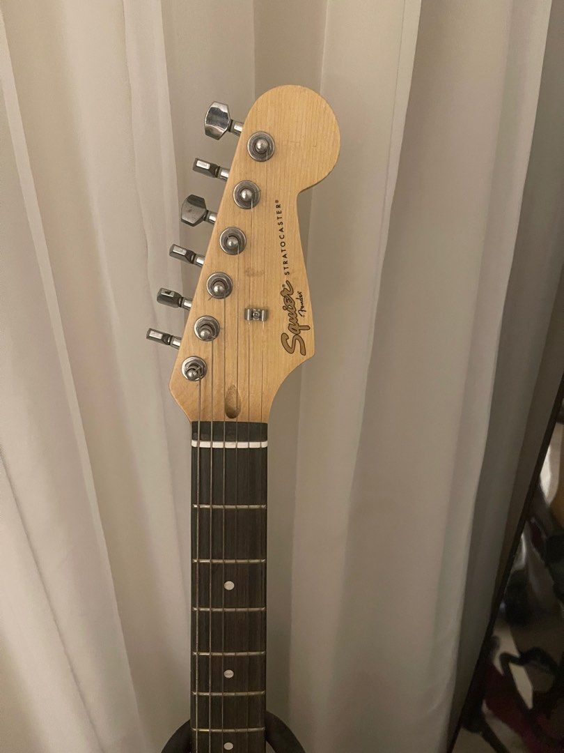 authentic Squier Fender Stratocaster for sale (Category: Musical Instruments) located in Quezon City. Submitted by ilovemunchies (Listing ID 1341352345, Image 3). Description: -rusty strings (can be replaced) -knob engraving are a little green but barely noticeable -barely used -no flaws -great condition rfs: need funds for my cat :) -gcash only -dm for more pics or details!.